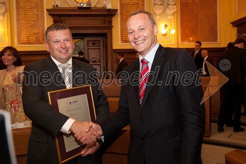 Tomaž Lovše, nekdanji predsednik Ameriške gospodarske zbornice (AmCham) in Matej Potokar, Direktor skupine za Microsoftove poslovne rešitve za regijo Srednje in Vzhodne Evrope, MICROSOFT d.o.o.; Ljubljana, predsednik Ameriške gospodarske zbornice (AmCham)