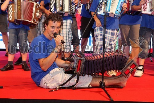 Tomaž Pustotnk, vodja harmonikarskega orkestra Pustotnik