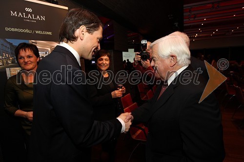 Jurij Giacomelli, predsednik uprave družbe Delo d.d. in Milan Kučan, nekdanji predsednik Republike Slovenije