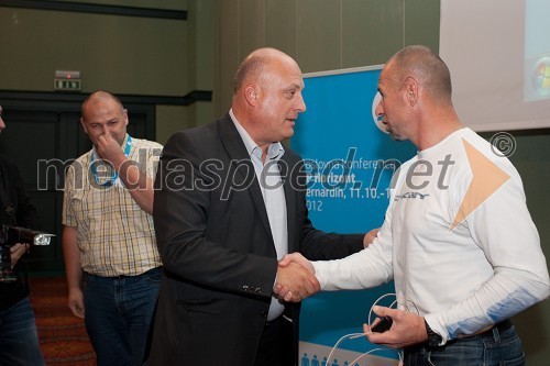 Iztok Klančnik, direktor HP Slovenija in Miran Stanovnik, motorist