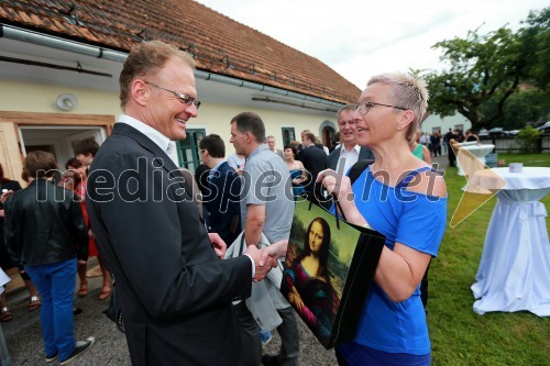 Janez Škrabec, direktor podjetja Riko d.o.o.; Alenka Žavbi, fotografinja