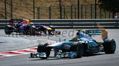 Lewis Hamilton, voznik mostva Petronas Mercedes; Sebastian Vettel, voznik mostva Red Bull Renault