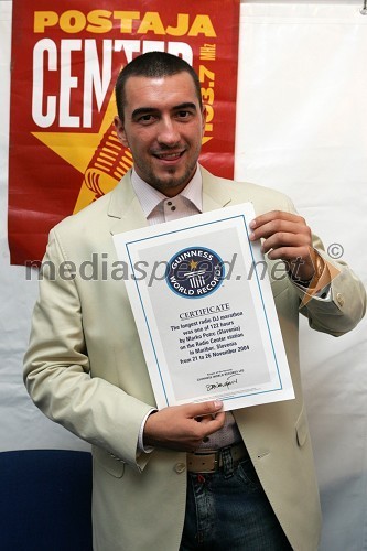 Marko Potrč s certifikatom Guinnessove knjige rekordov