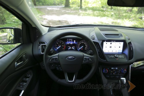 Ford Kuga 2.0 TDCi 132 kW Powershift AWD Titanium, voznikovo delovno okolje