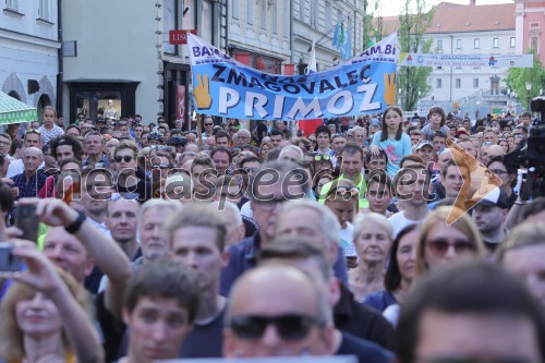 Topel sprejem kolesarskih junakov