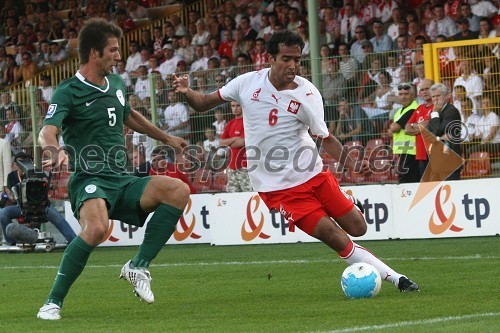 Bostjan Cesar, slovenski nogometaš in Roger Guerreiro, poljski nogometaš