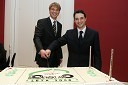 Torto zmagovalcev sta najprej razrezala oba direktorja Porsche Slovenija d.o.o.: Wilfried Weitgasser in Danilo Ferjančič