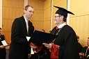 Dr. Matjaž Perc, dobitnik Bronastega znaka UM za leto 2009 in prof. dr. Ivan Rozman, rektor Univerze v Mariboru