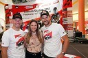 Miran Stanovnik, motorist, Alenka Šurlan, povezovalka prireditve in Marc Coma, zmagovalec Rally Dakar