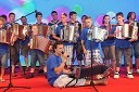 Harmonikarski orkester Pustotnik in Tomaž Pustotnk, vodja orkestra