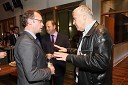 Kevin Morrison, predsednik upravnega odbora Britanske gospodarske zbornice in Zoran Predin, pevec