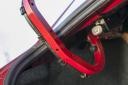 Mazda3 CD150 Revolution Top, nezaščiteno vodilo odpiranja prtljažnika je lahko moteče