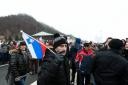 Protesti proti dodatni obdavčitvi delavcev migrantov