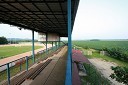 Moto park Lendava, pogled iz tribune na Speedway stadion Petišovci in desno na polja, kjer bo potekala moto proga Moto parka Petrolija Lendava