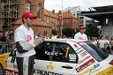 Tomaž Kaučič, voznik in zmagovalec rallyja ter Peter Zorenč, sovoznik in zmagovalec rallyja (slo) ob vozilu Mitsubishi Lancer EVO IX